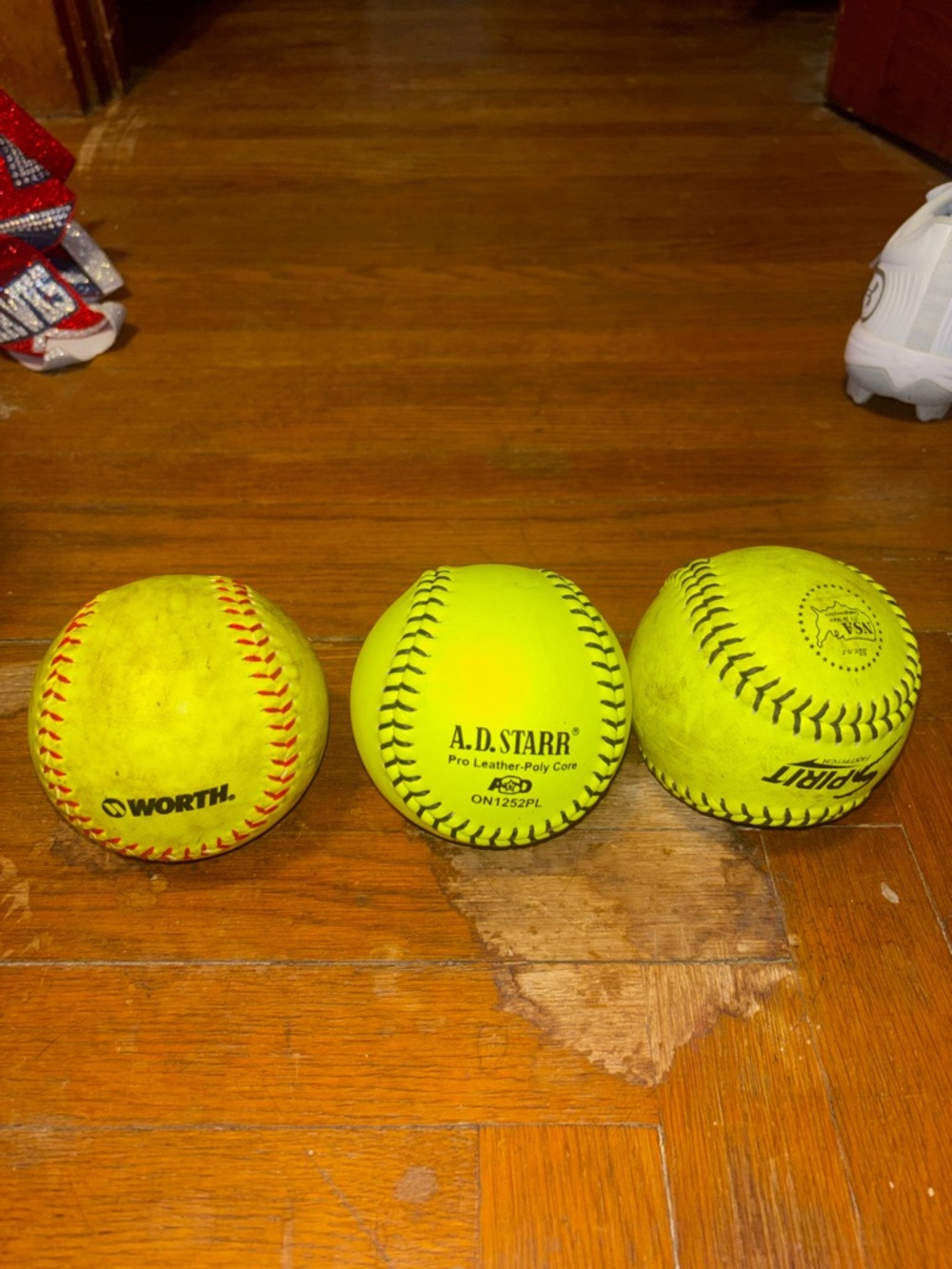 A.D. STARR Neon Yellow Softball (Center) + Assorted Yellow Softballs